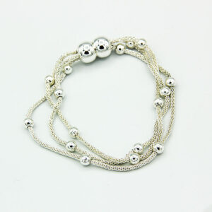 silver triple chain bracelet